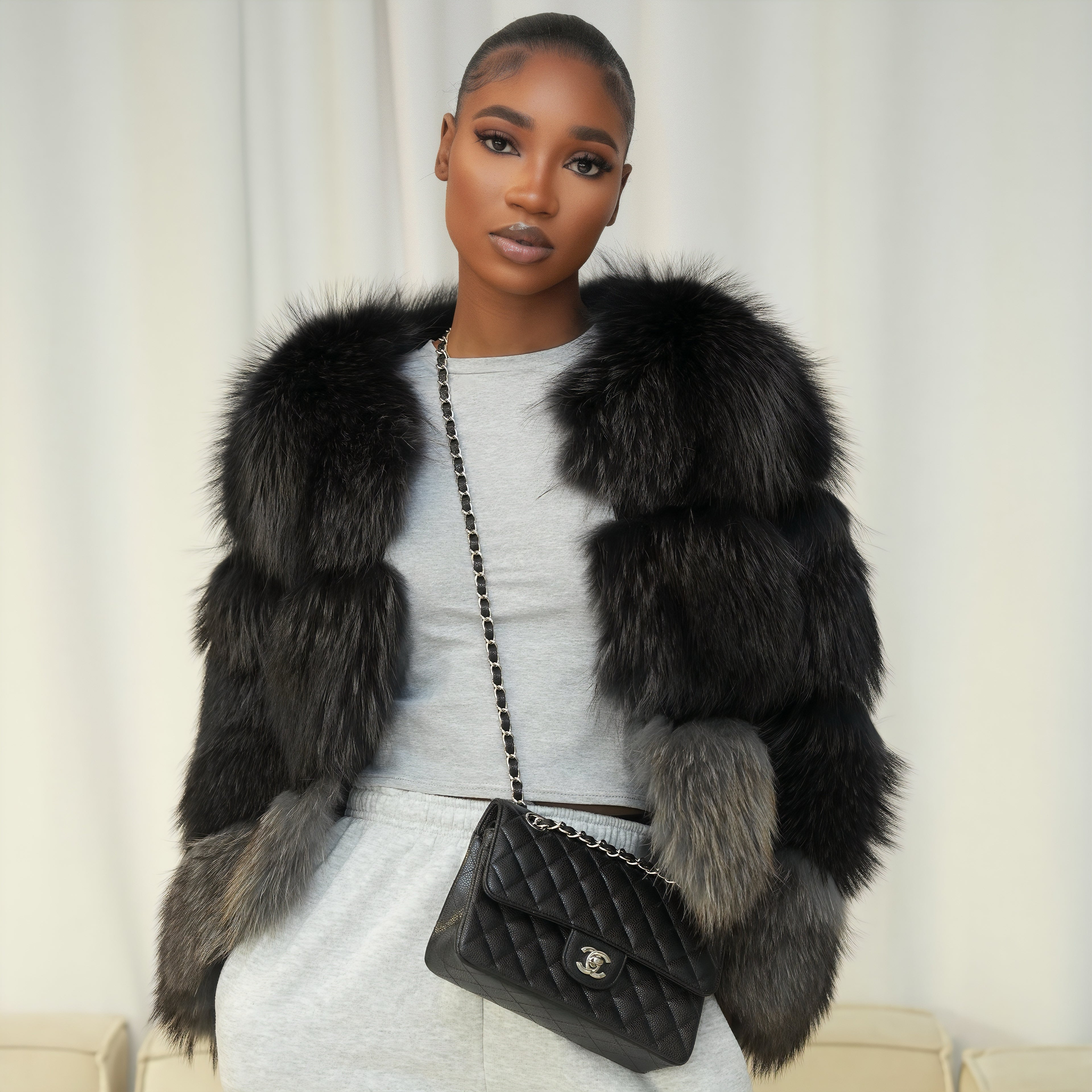 QUEENETTE TWO-TONE RACCOON FUR BOMBER